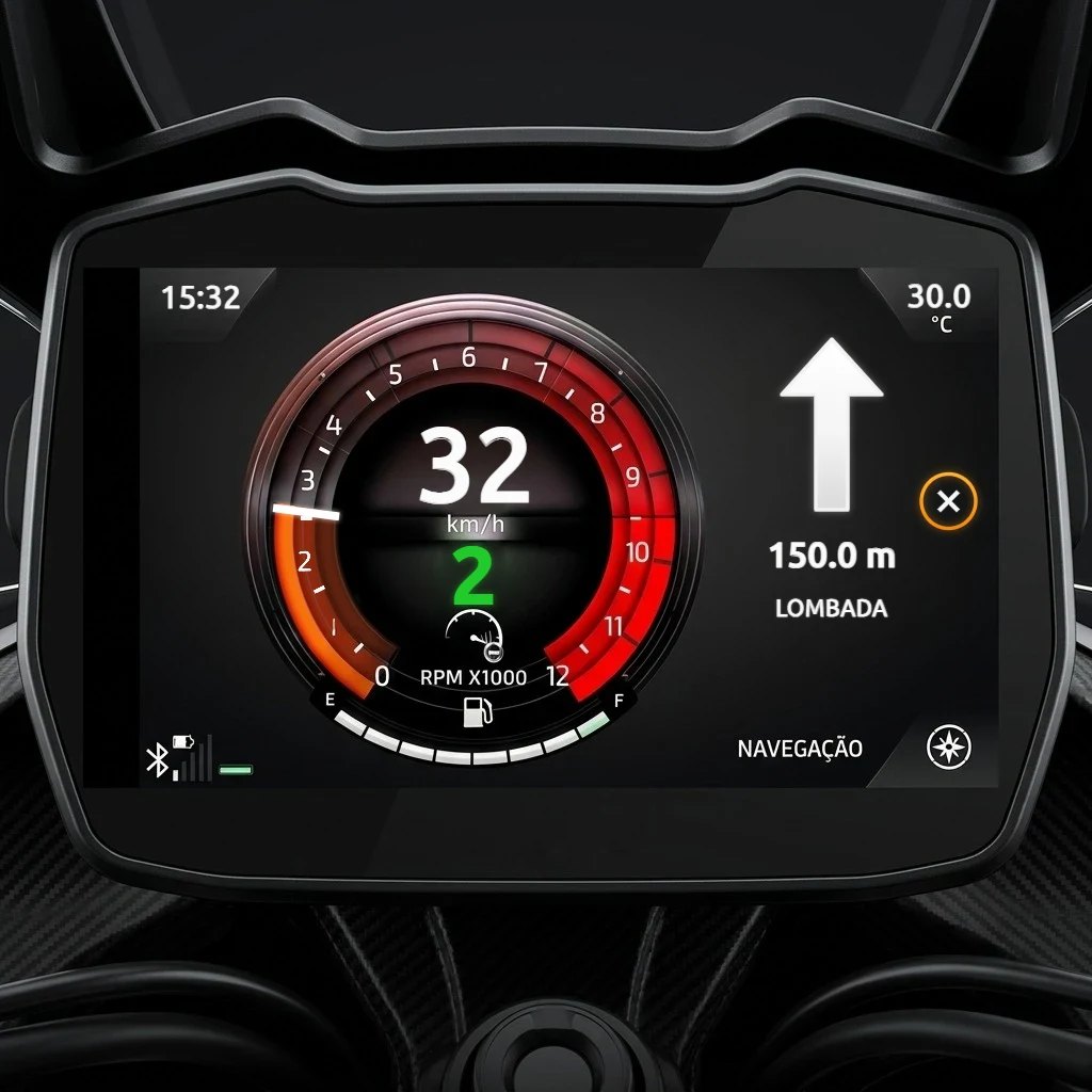 TFT panel at 32 km/h in 2nd gear showing a straight arrow, 150 meters and the warning LOMBADA (speed bump)